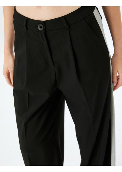 Cepli Düz Bol Paça Yanları Şerit Detaylı Kumaş Pantolon indirimleri