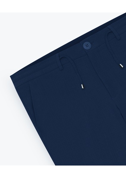 Erkek Lacivert Slim Fit Dar Kesim Beli Bağlamalı Yan Cep Gofre Desenli Pantolon