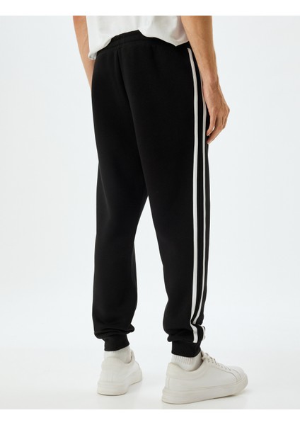 Eşofman Altı Beli Bağcıklı Şardonlu Cep Detaylı Pamuk Karışımlı Biyeli fırsatları