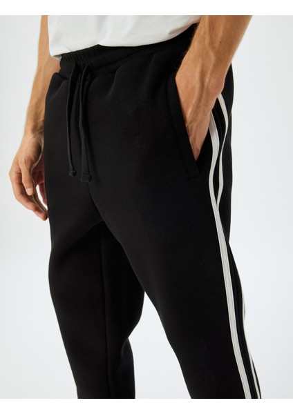 Eşofman Altı Beli Bağcıklı Şardonlu Cep Detaylı Pamuk Karışımlı Biyeli indirimleri