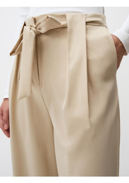 Bej Yüksek Bel Rahat Kesim Bol Paça Dokuma Pantolon indirimleri