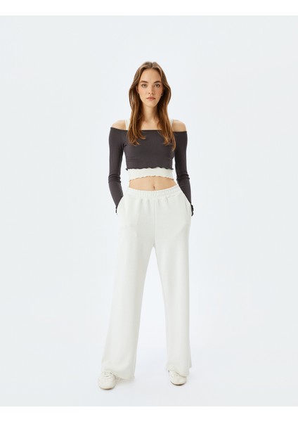 Uzun Kollu Atletli Kayık Yaka Crop Kaşkorse Slim Fit Tişört fiyatları