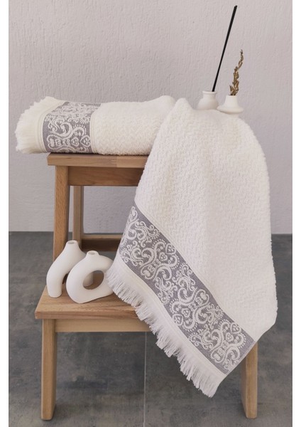 2'li mor pamuklu kabartma bordürlü ve püsküllü el/yüz havlusu 50x85 cm