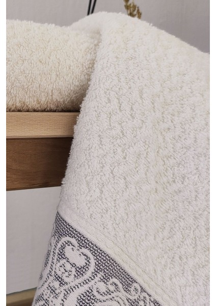 2'li mor pamuklu kabartma bordürlü ve püsküllü el/yüz havlusu 50x85 cm fiyatları