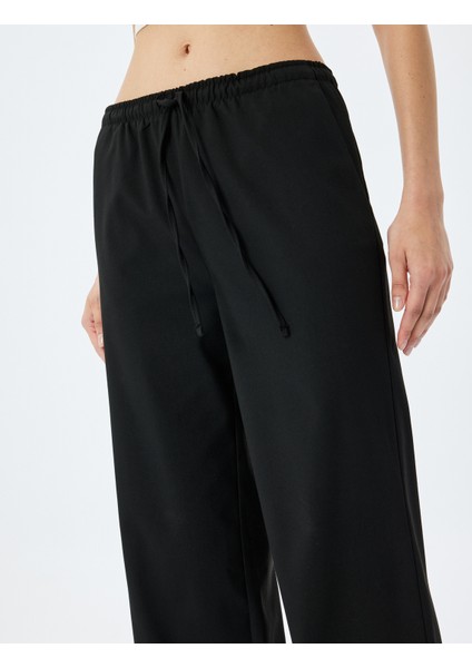 Düz Bol Paça Cepli Eşofman Pantolon