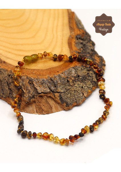 Fosilli Ukrayna Damla Kehribar Çocuk Kolyesi 201023497 fiyatları