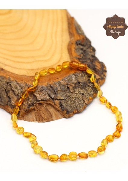 Şeffaf Ukrayna Damla Kehribar Çocuk Kolyesi 201023499 fiyatları