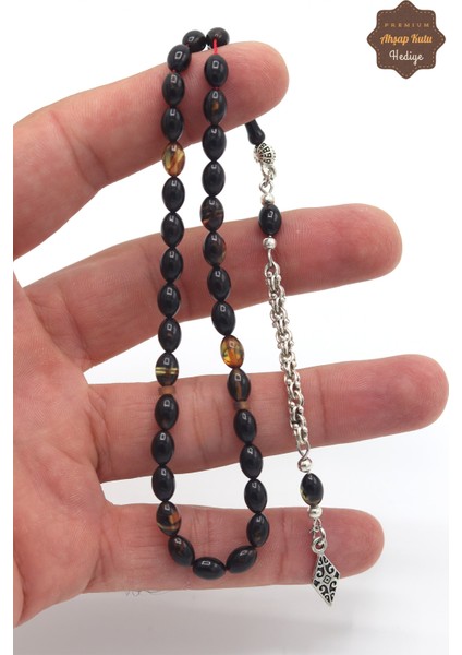 Hareli Siyah Arpa Kesim Alpaka Püsküllü Ateş Kehribar Tesbih 201023473 fırsatları