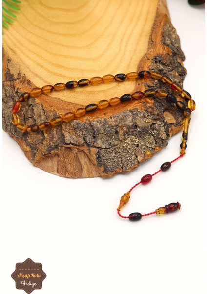 Sarı Siyah Arpa Kesim Özel Sistem Püsküllü Ateş Kehribar Tesbih 201023467 fiyatları