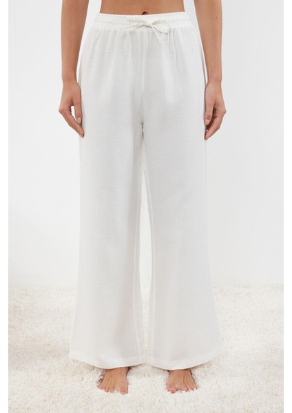 Kadın Geniş Paça Askılı Kol Pamuklu Müslin Fırfır ve Bağlama Detaylı Dokuma Pijama Takımı fiyatları