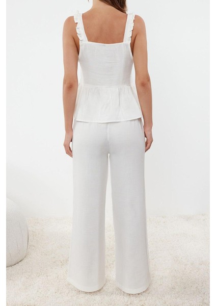 Kadın Geniş Paça Askılı Kol Pamuklu Müslin Fırfır ve Bağlama Detaylı Dokuma Pijama Takımı fırsatları