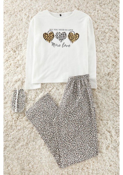 Kadın Boru Paça Uzun Kol Pamuklu Leopar Desenli Kalpli Iç Polarlı Uyku Bantlı Pijama Takımı