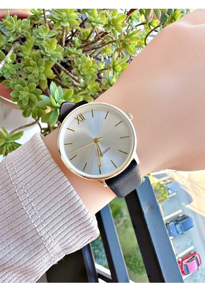 QW33G77X Altın Renk Siyah Deri Kordonlu Kadın Kol Saati fiyatları