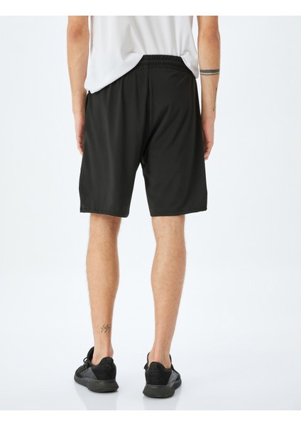 Beli Bağcıklı Cep Detaylı Slogan Baskılı Spor Şort fırsatları