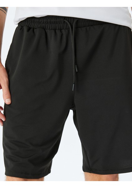 Beli Bağcıklı Cep Detaylı Slogan Baskılı Spor Şort indirimleri