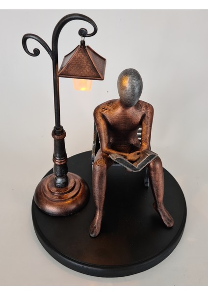 Bankta Kitap Okuyan Insan Figürü Büyük Boy Biblo (Bakır Profösör) modelleri