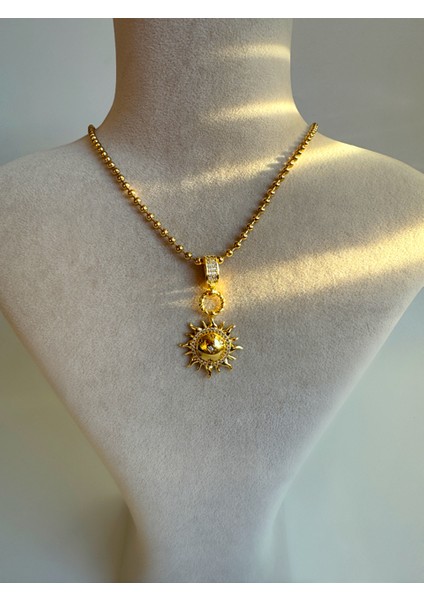 Zirkon Taş Detaylı Güneş Gold Çelik Kolye