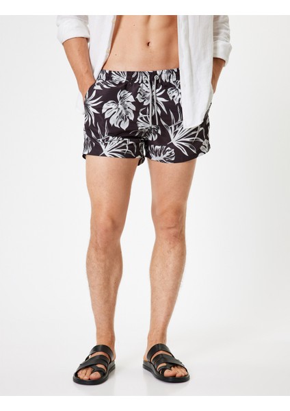 Oversize Deniz Şortu Kısa Yaprak Desenli Beli Bağcıklı modelleri