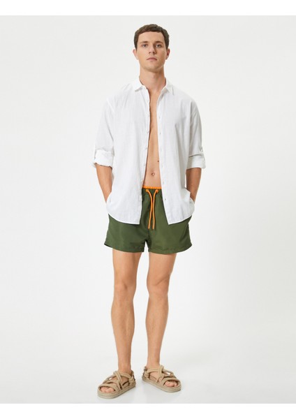 Kısa Deniz Şortu File Astarlı Beli Bağlamalı Cepli Rahat Kalıp fiyatları