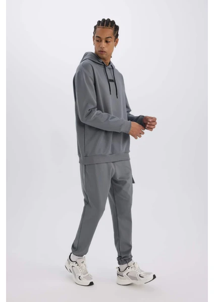 DeFactoFit Sporcu Jogger Eşofman Altı Standart Fit Üç Cepli Beli Bağcıklı Lastikli Paça D3741AX24WN