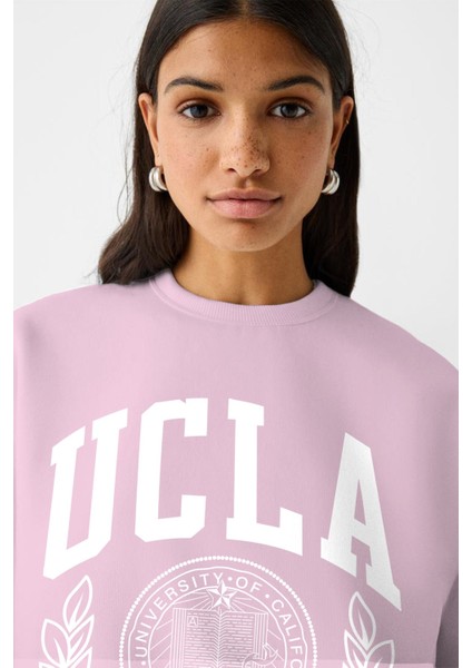 Ucla Yazı Baskılı Bisiklet Yaka Içi Polar Oversize Kesim Pembe Sweatshirt