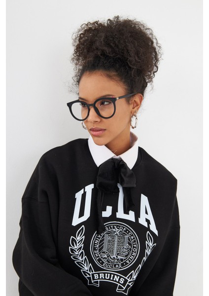 Ucla Yazı Baskılı Bisiklet Yaka Içi Polar Oversize Kesim Siyah Sweatshirt indirimleri