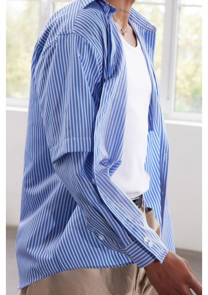 Şık Çizgili Desen Gömlek Yaka Limited Edition Relaxed Fit Alttan Çıkma Kollu Gömlek fırsatları