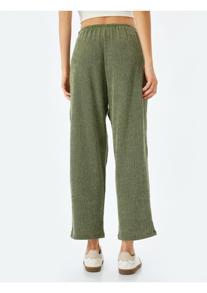 Beli Bağlamalı Dokulu Bol Paça Pantolon