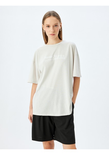Arkası Baskılı Sloganlı Bisiklet Yaka Kısa Kollu Oversize T-Shirt