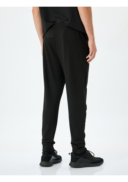 Fermuarlı Cepli Viskon Karışımlı Jogger Spor Eşofman Altı fırsatları