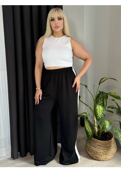 Kadın Büyük Beden Yanları Şeritli Yırtmaçlı Esnek Kristal Pantolon modelleri