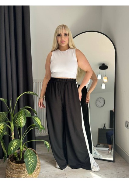 Kadın Büyük Beden Yanları Şeritli Yırtmaçlı Esnek Kristal Pantolon modelleri