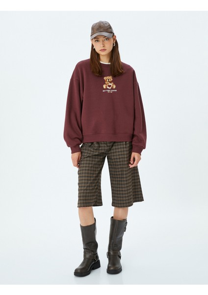 Ayı Işlemeli Sloganlı Bisiklet Yaka Şardonlu Oversize Sweatshirt fiyatları