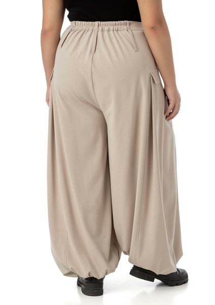 Büyük Beden Şalvar Kesim Beli Arkadan ve Paçası Lastikli Derin Plikaşe Detaylı Bej Rengi Pantolon modelleri