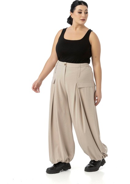 Büyük Beden Şalvar Kesim Beli Arkadan ve Paçası Lastikli Derin Plikaşe Detaylı Bej Rengi Pantolon fırsatları