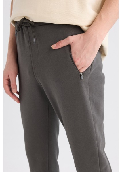 Jogger Eşofman Altı Slim Fit Dar Kesim Beli Bağcıklı Lastikli Paça Fermuar Cepli A4387AX24AU