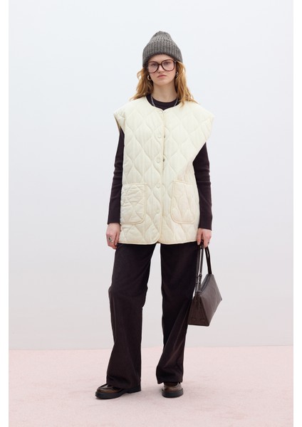 Kapitone Cepli Yelek Vanilya modelleri