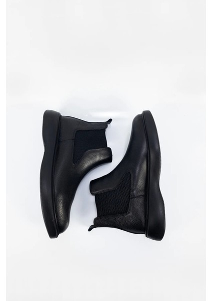 Erkek Siyah Su Geçirmez Hakiki Deri Bağcıksız Lastikli Bot modelleri