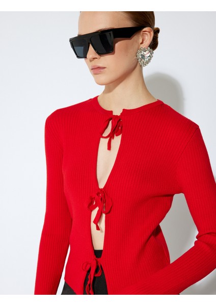 x Sibil Çetinkaya - Uzun Kollu Önü Bağlamalı Fiyonklu Triko Hırka