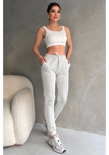 Kadın Paçası Lastikli Vücuda Oturan Gri Melanj Fit Jogger Eşofman Altı fırsatları