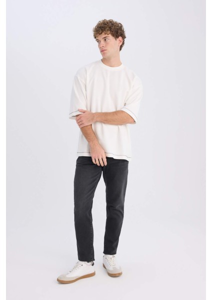 Slim Tapered Fit Dar Kalıp Normal Bel Daralan Paça Jean Pantolon D8748AX25SP indirimleri