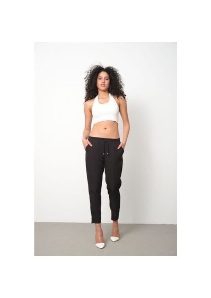Kadın Havuç Kesim Bilek Boy Ip Detaylı Beli Lastikli Kumaş Pantolon fiyatları