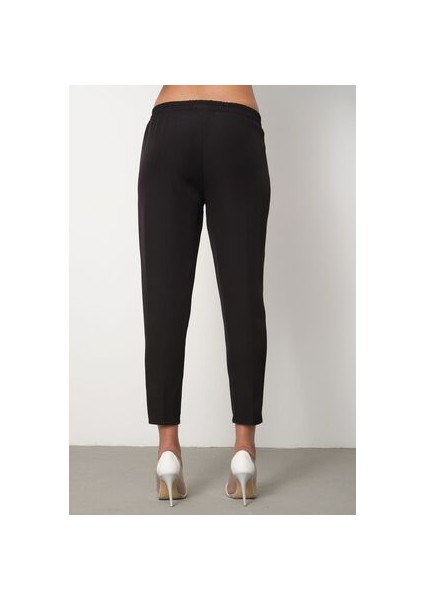 Kadın Havuç Kesim Bilek Boy Ip Detaylı Beli Lastikli Kumaş Pantolon fırsatları