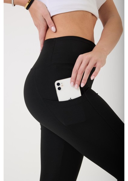 Kadın Siyah Yüksek Bel Toparlayıcı Çift Cepli Dar Paça Spor Tayt fiyatları