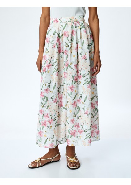 Yırtmaç Detaylı Cepli Yüksek Bel Uzun Kloş Çiçekli Etek modelleri