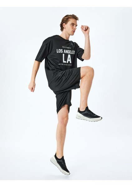 Bisiklet Yaka Yarım Kollu Slogan Baskılı Oversize Spor Tişört fiyatları