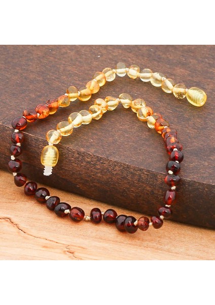 Bebek Damla Kehribar Diş Kolye fırsatları