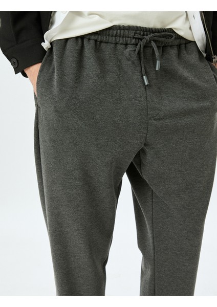Beli Bağcıklı Pantolon Cep Detaylı Katlamalı Paça