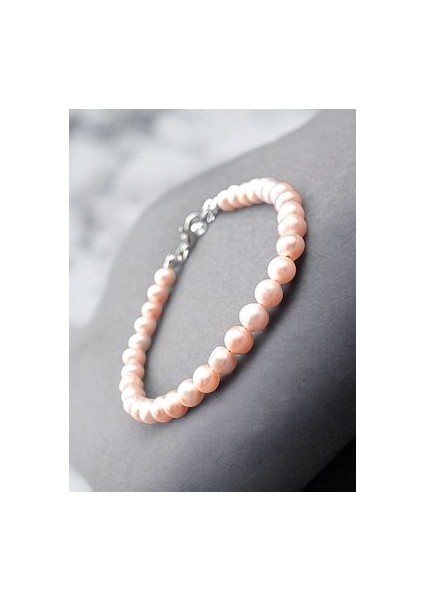 Inci Natural Pembe Inci Bileklik 6/7 mm fiyatları
