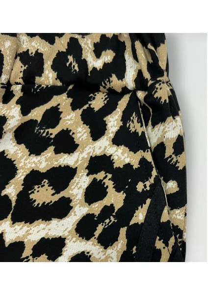 Kız Çocuk Çiçek Aksesuarlı Leopar Eşofman Takımı modelleri